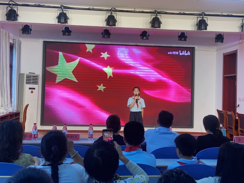 图2：7月4日，高新区顾官屯镇中心小学举行“红七月”革命故事大赛，学生组正在宣讲红色革命故事.jpg